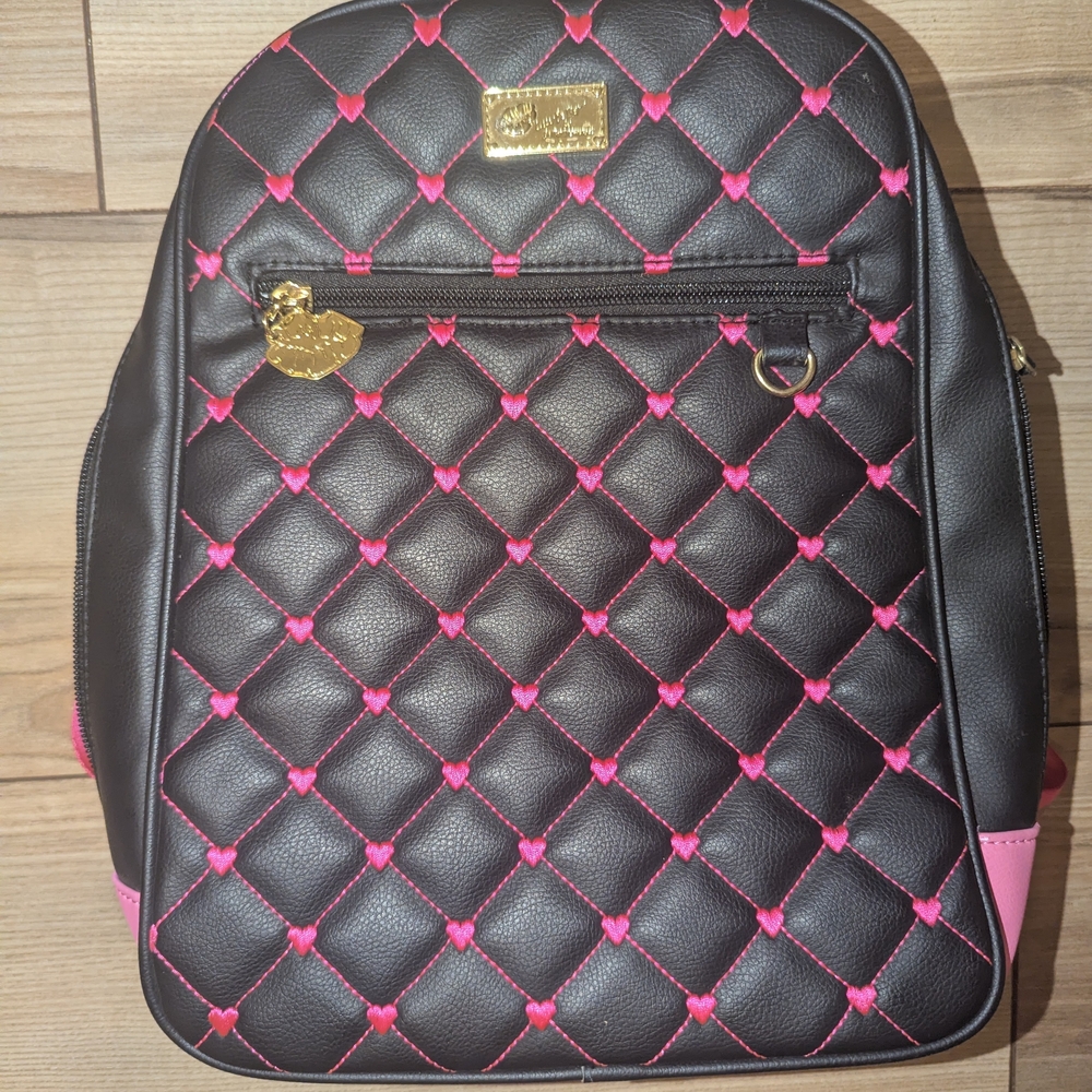 Betsey Johnson Black Backpack with Pink Quilted Pattern.